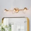 LALUZ 3-Light Matte Gold Modern Bathroom Vanity Light With Clear Glass Shade