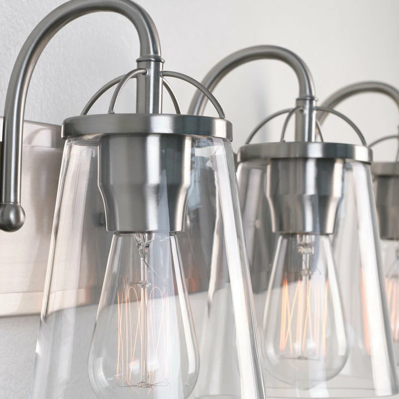 Kira Home Voltaire 24" Farmhouse Bathroom Light, Glass Shades, Brushed Nickel 4 Kira Home Voltaire 24" Farmhouse Bathroom Light, Glass Shades, Brushed Nickel - Image 4