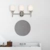 A Touch Of Design 3-Bulb Vanity Light Bright Satin Nickel Finish With White Glass Sconce