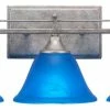 Toltec Lighting Uptowne 3 Light Bath Bar Shown In Aged Silver Finish With 7" Blue Italian Glass