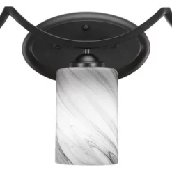 Toltec Lighting Zilo 3 Light Bath Bar Shown In Matte Black Finish With 4" Onyx Swirl Glass